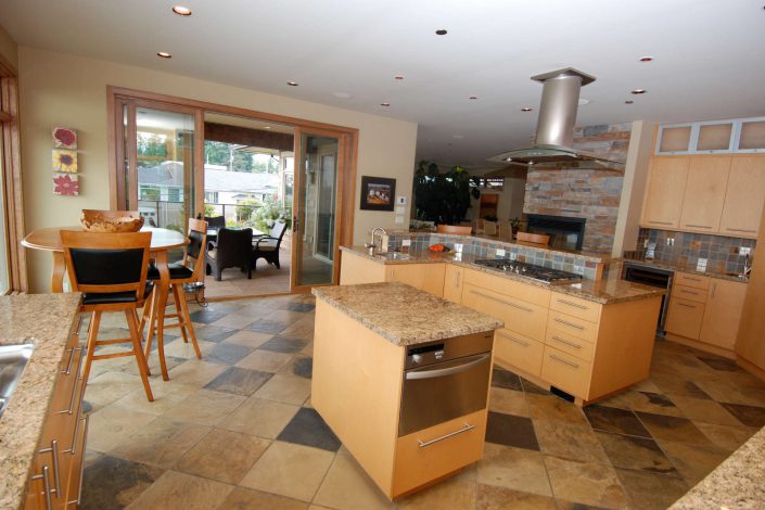 A photo of the kitchen of a cedar style estate home built by Surfside Construction.