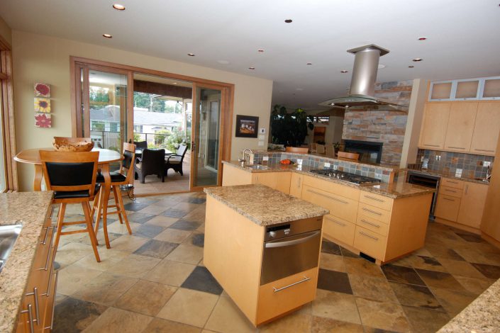A photo of the kitchen of a cedar style estate home built by Surfside Construction.