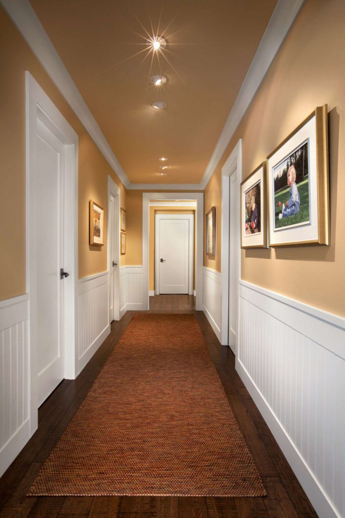 A photo showing the hallway of the country classic home built by surfside construction inc.