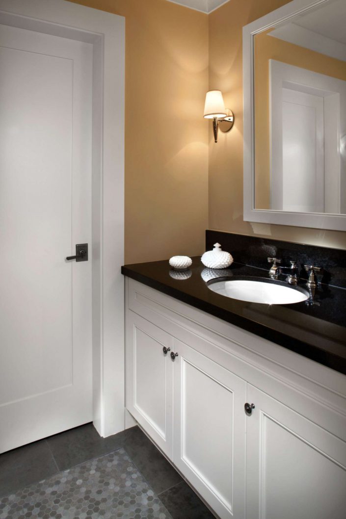 A photo showing one of the bathrooms of the country classic home built by surfside construction inc.