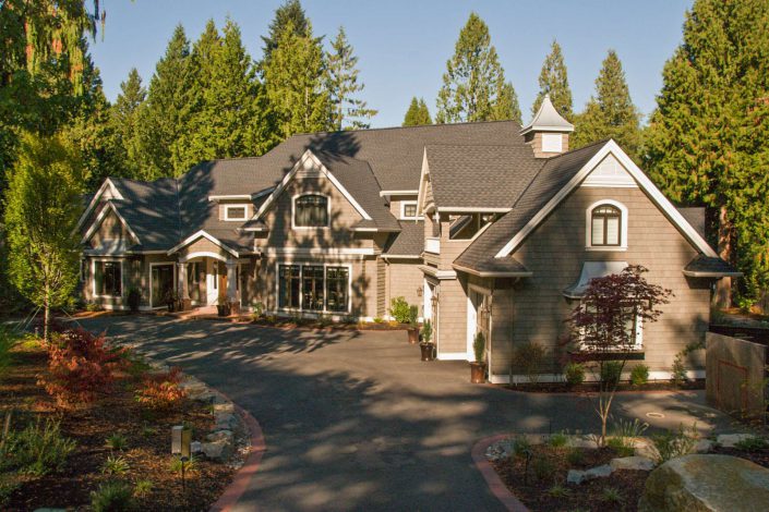 A photograph of the front of a Country Estate built by Surfside construction.