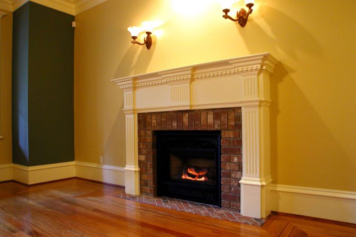 another photo of a fireplace in the victorian replica as built by surfside construction inc.