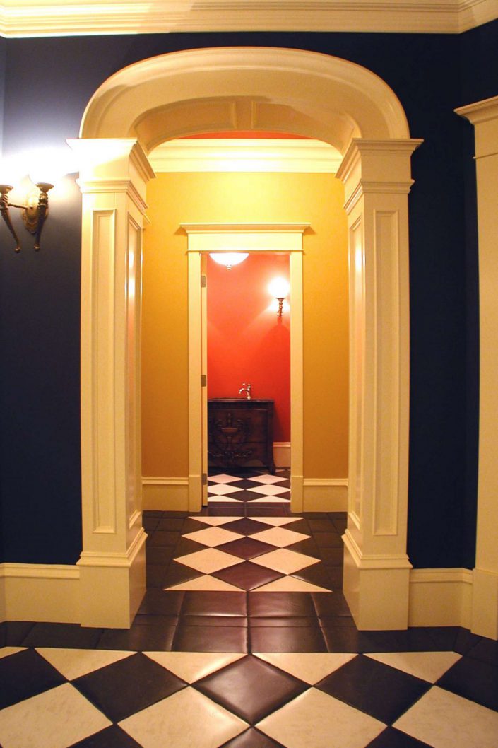 A photo taken from the hallway of the victorian replica home looking into the spare bathroom as built by surfside construction inc.