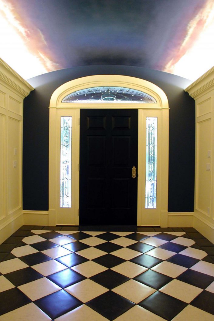 a photo of the front door of the victorian replica home as built by surfside construction inc.