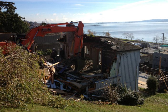 A photo of the demolition of the old home on the west beach home in white rock bc. ready for surfside construction inc. to build the new home.
