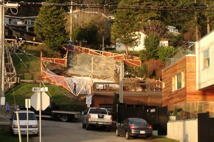 A view from the street of the west beach home in white rock bc during the excavation as built by surfside construction inc.