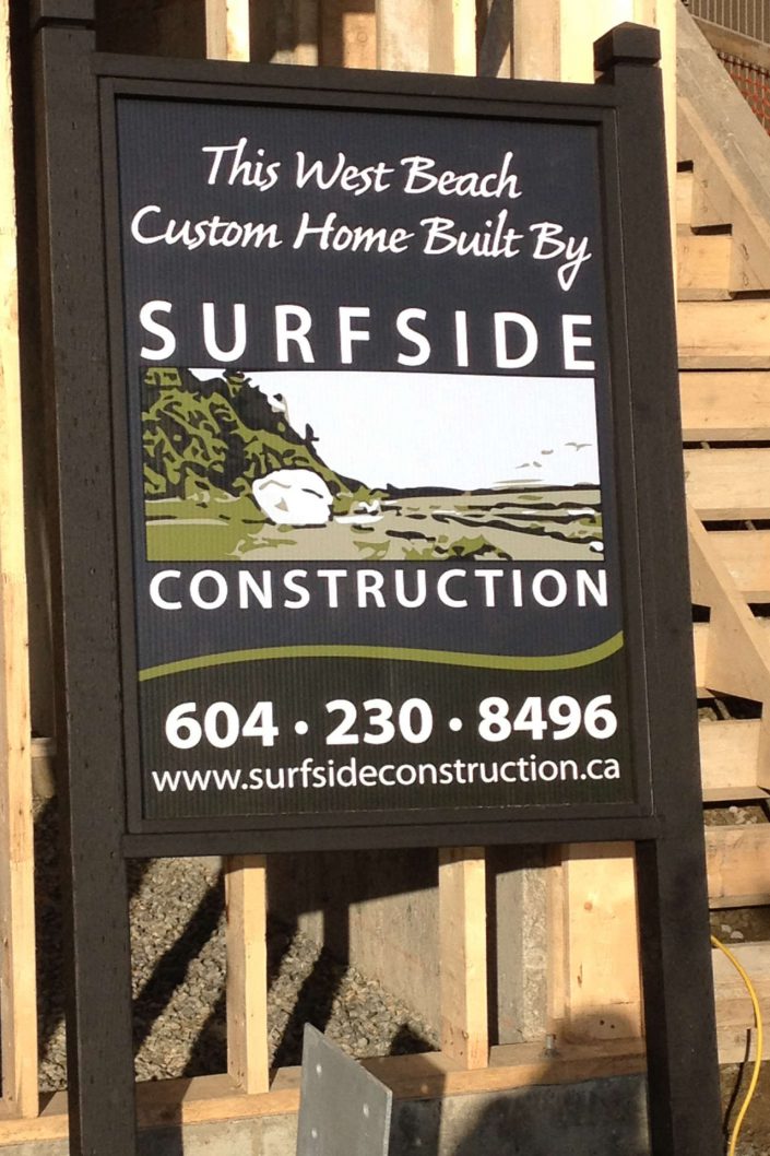 A shot of the Surfside construction inc. sign as it sits on the west beach home site in white rock bc.