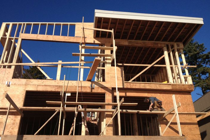 another image from a different angle of the walls being framed in the west beach home as built by surfside construction inc.