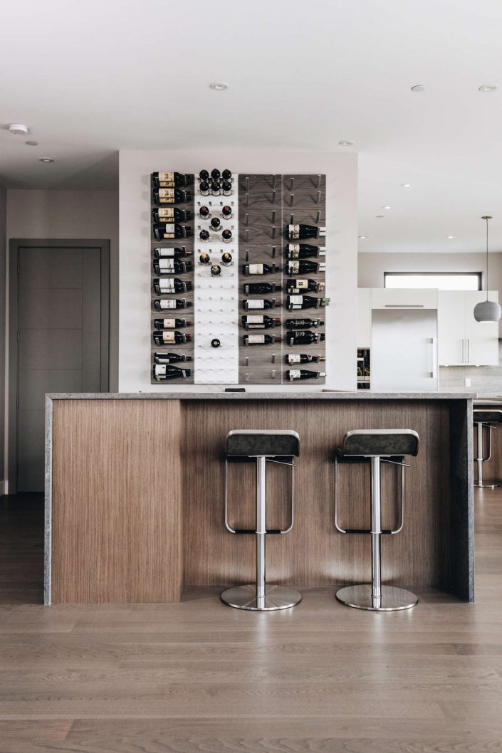 a photo of the bar and wine rack in the hillside modern home as built by surfside construction inc.